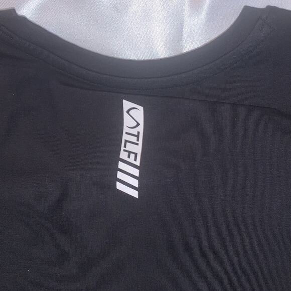 TLF Apparel Sliced Gym Crop Tee. Black.‎ - Picture 5 of 12
